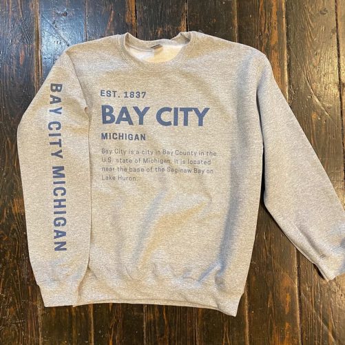 Long sleeve sweatshirt with information about Bay City, Michigan.